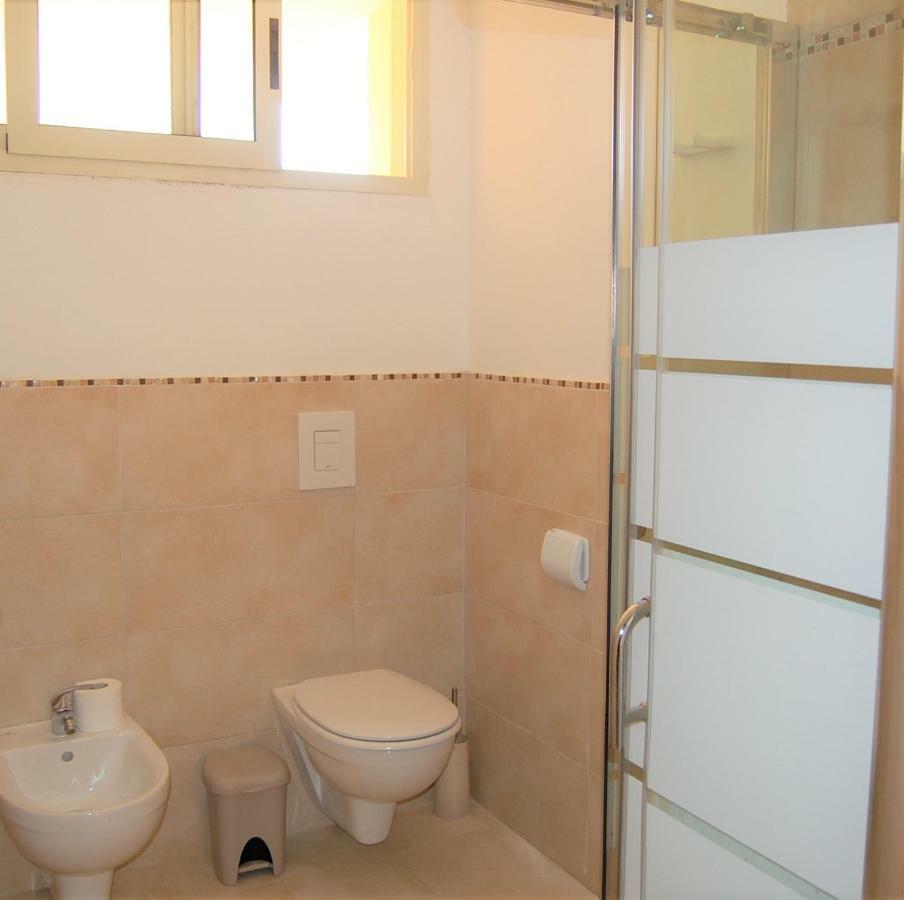 I Lentischi Aparthotel วิลลัสซีมีอุส ภายนอก รูปภาพ